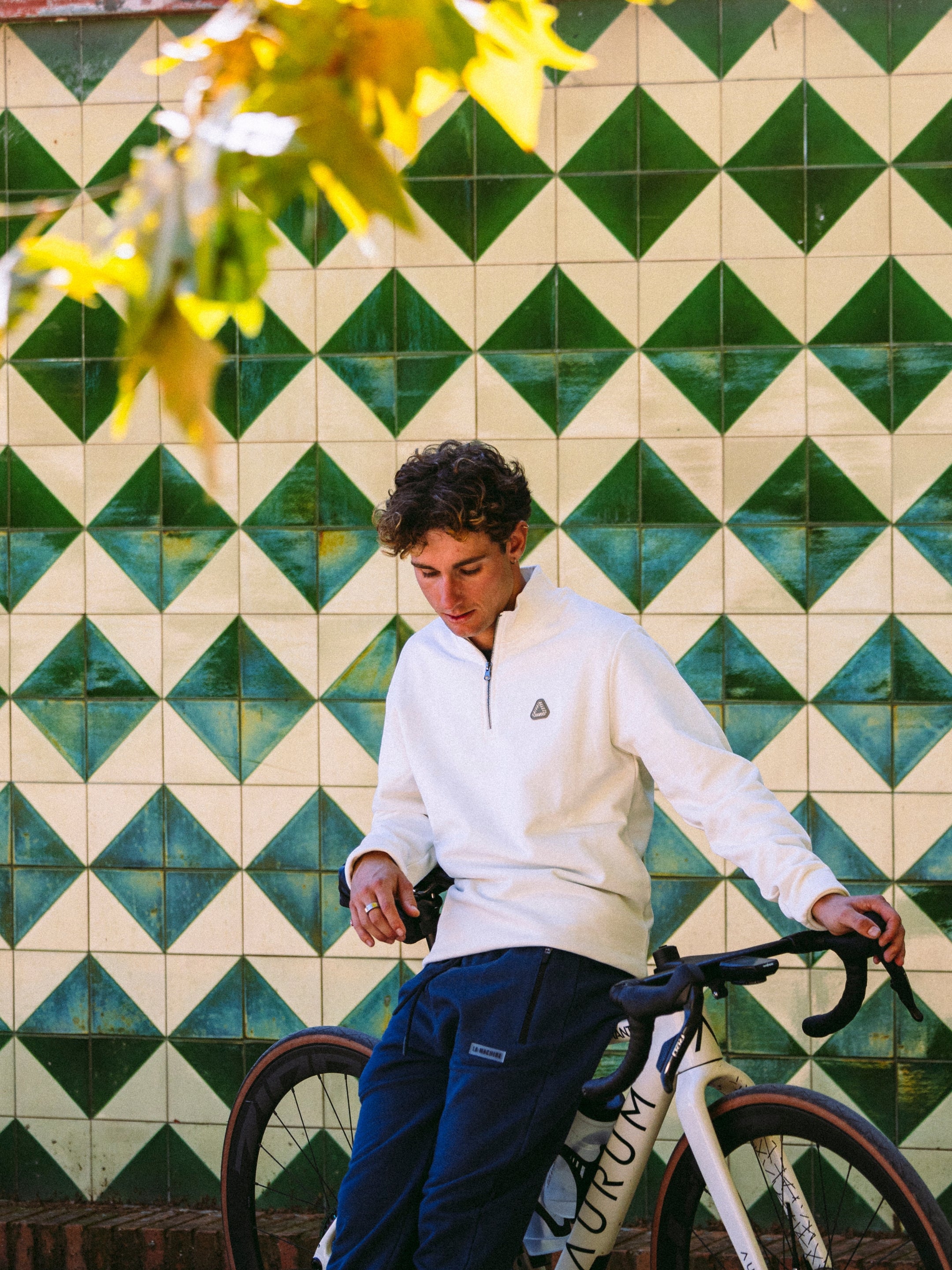 Detail view of the Vai Allez Vamos - Half Zipper - Sweatshirt - Star White by La Machine Cycle Club.