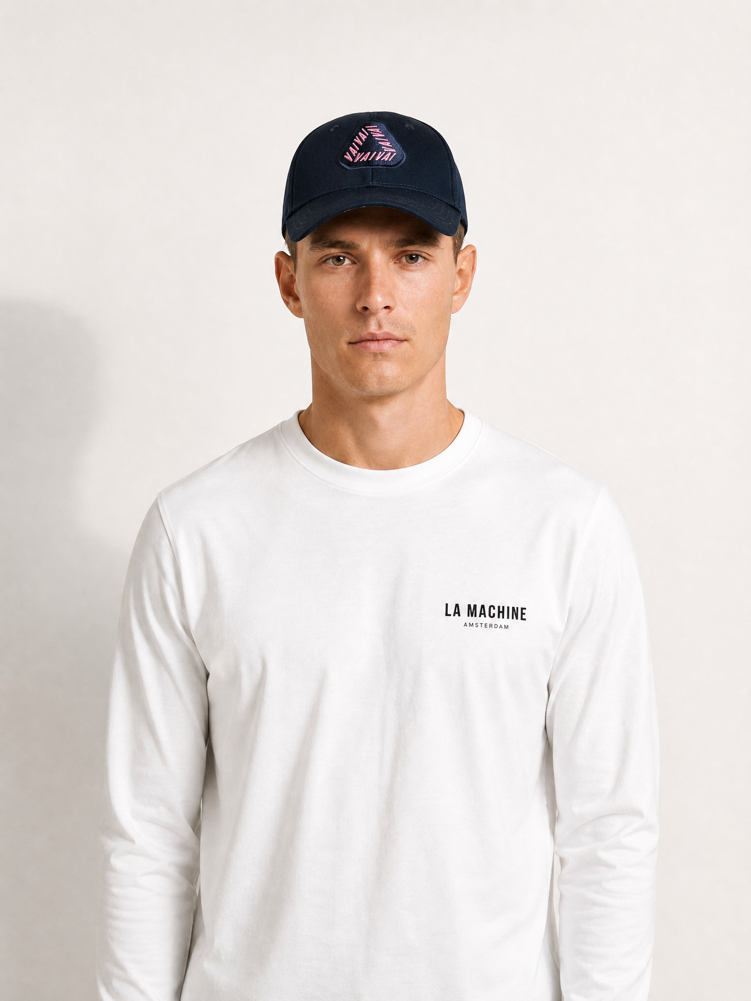 A model wearing the Vai Vai - Casual Cap by La Machine Cycle Club.
